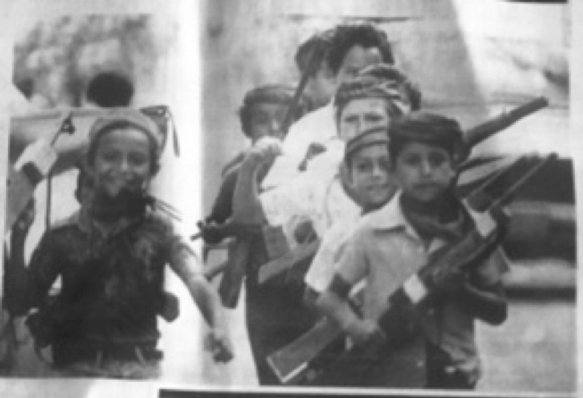 A group of people posing for a photo

Description automatically generated